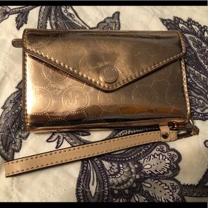 Gold Michael Kors tech wristlet